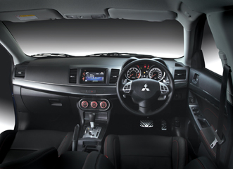A glimpse of the Mitsubishi Lancer Sportback VRX interior. Modern materials and blue lighting look very nice.