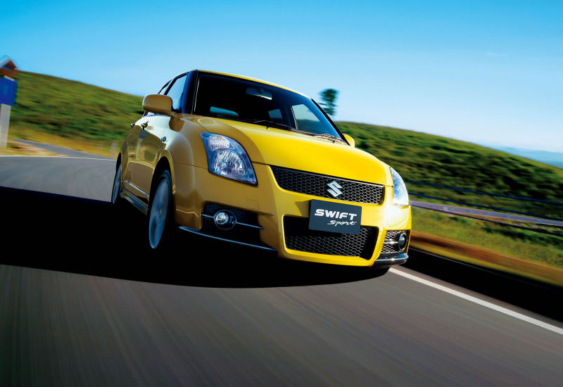 You can't quite see it in this picture, but anyone who drives the Suzuki Swift Sport is sure to be smiling at how great this car is to drive.