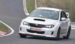 The new WRX winging it on the corner at Nurburgring.
