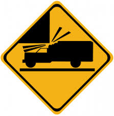 Low bridge coming! Duck your head and shrink down in your seat behind the wheel, as this really helps your car fit underneath.