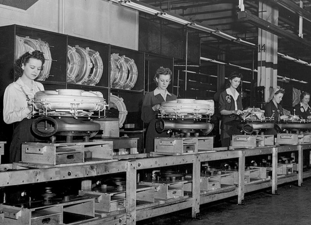 Rosie the Riveter and friends making Tin Lizzies on the Ford production line.