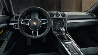 Overseas model of Porsche Cayman GT4 shown.