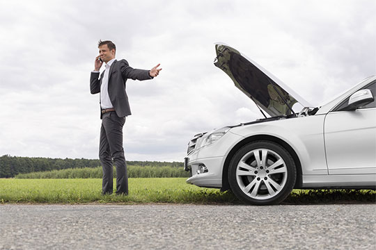 man-on-phone-with-broken-down-car-main