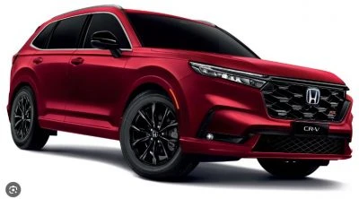 2024 Honda CR-V SUV hybrid exterior in red.