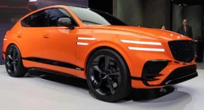 2024 Genesis GV80 Coupe SUV side view, orange