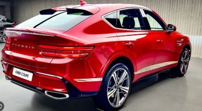 2024 Genesis GV80 Coupe SUV, rear view, red.