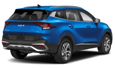 2024 Kia Sportage Hybrid SUV rear in blue